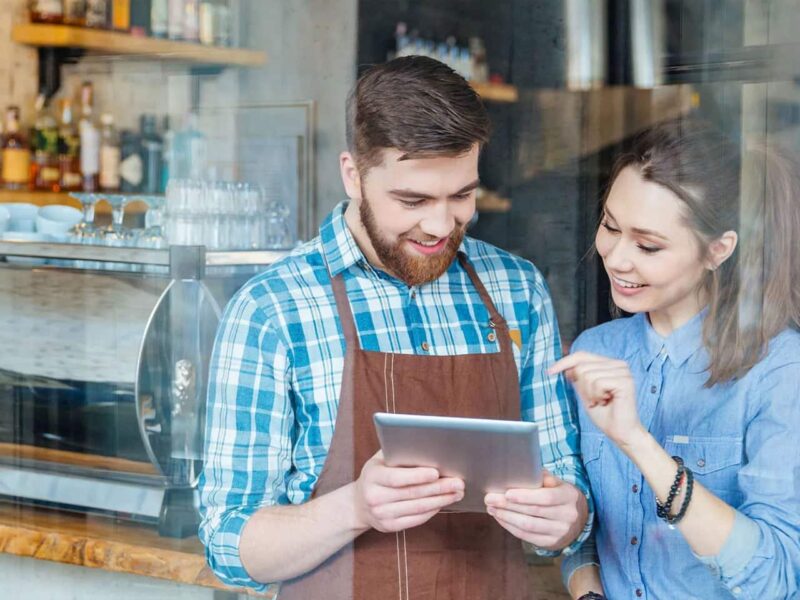 restaurant employees using technology to predict demand