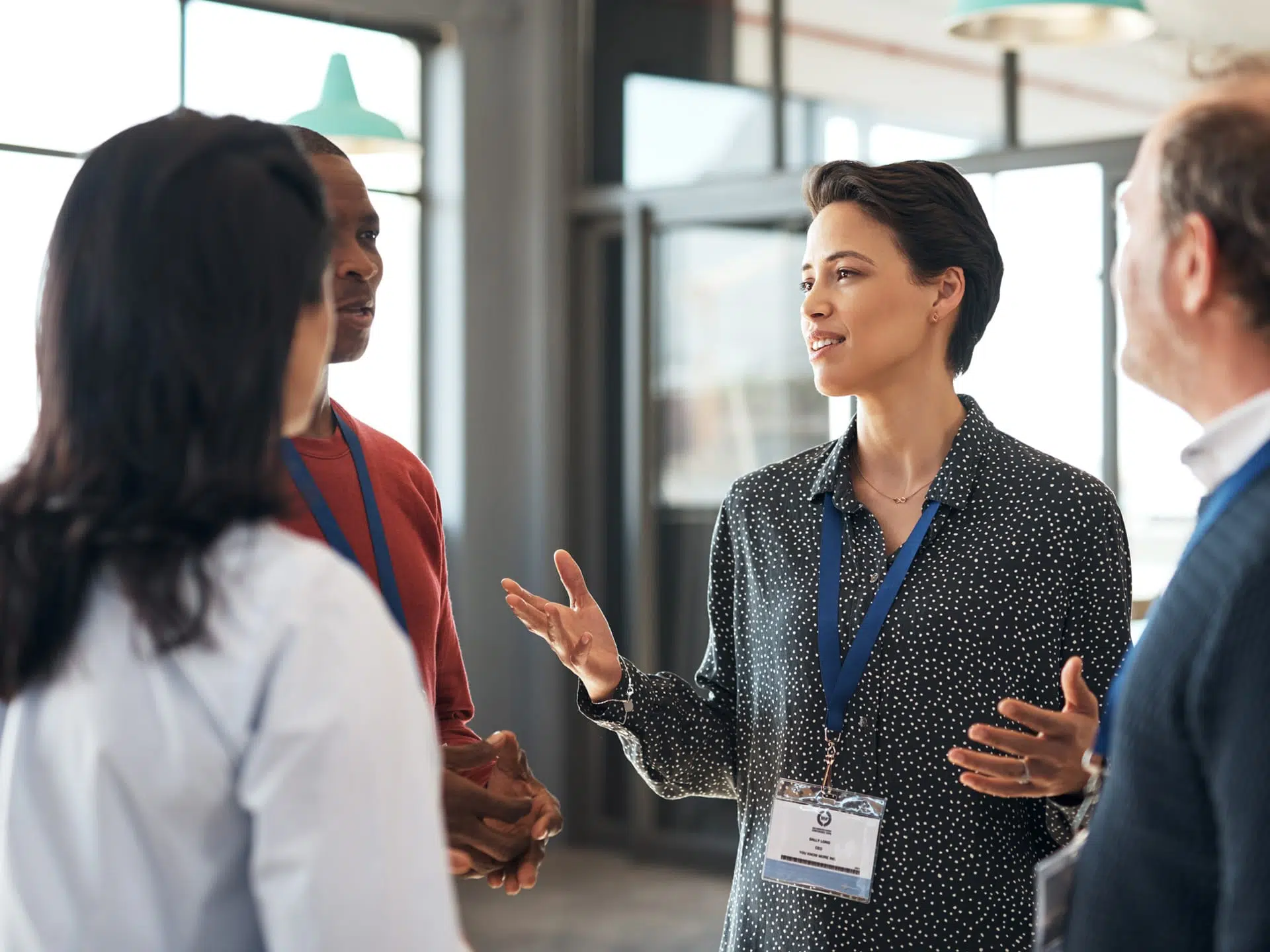 employees speaking in a group