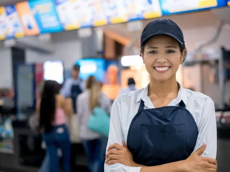 happy employee in a fast food store