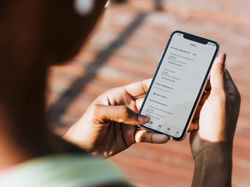 employee checking shifts on hotschedules