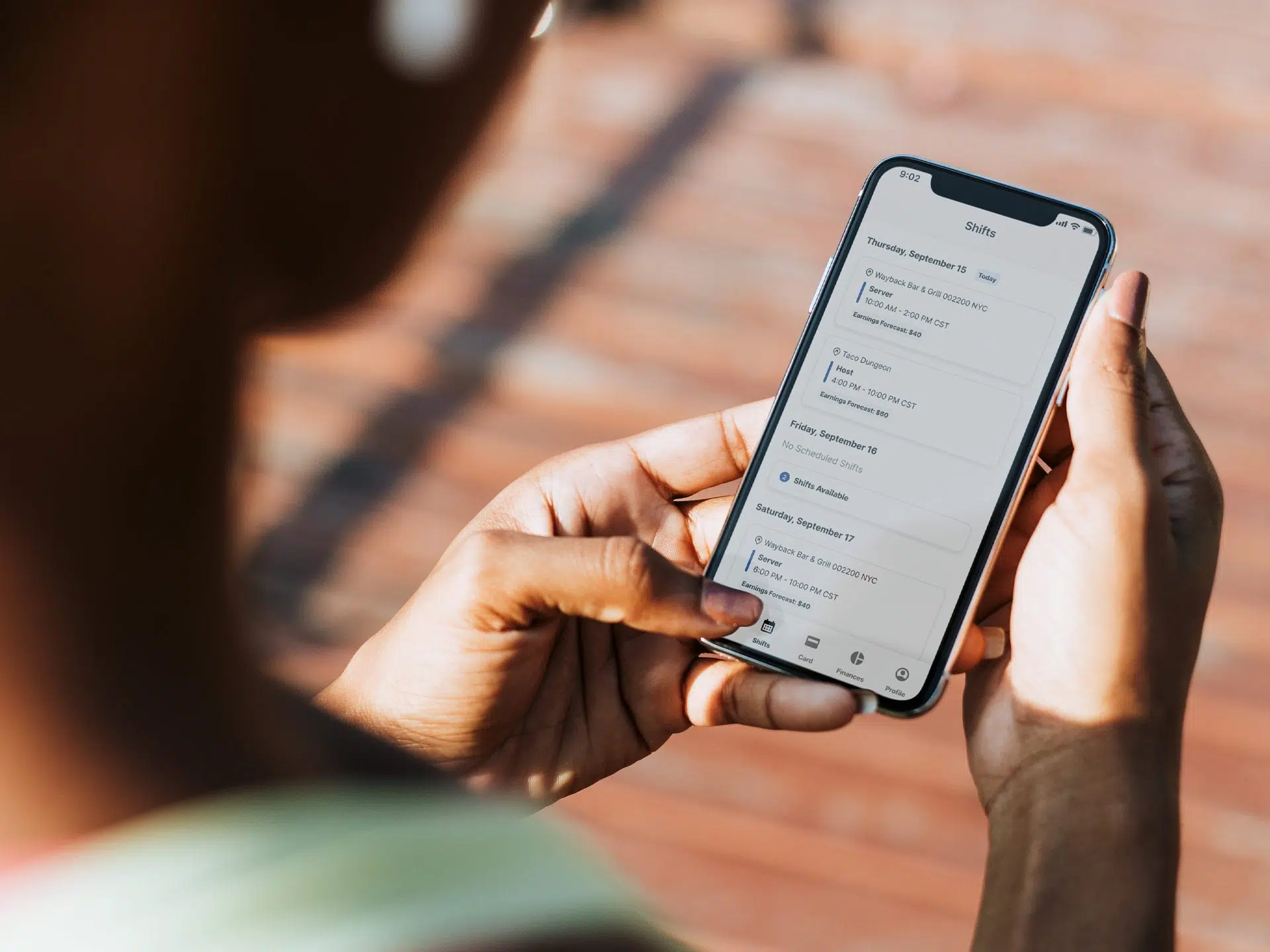 employee checking shifts on hotschedules